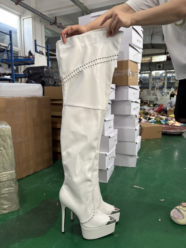 White studs up boots
